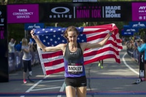 Molly Huddle (USA) wins the 2014 Oakley Mini in an American record in Central Park, NY.  (Courtesy of NYRR)