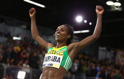 Dibaba celebrating World Indoor gold in 2016 (Photo by Ian Walton/Getty Images for IAAF)"